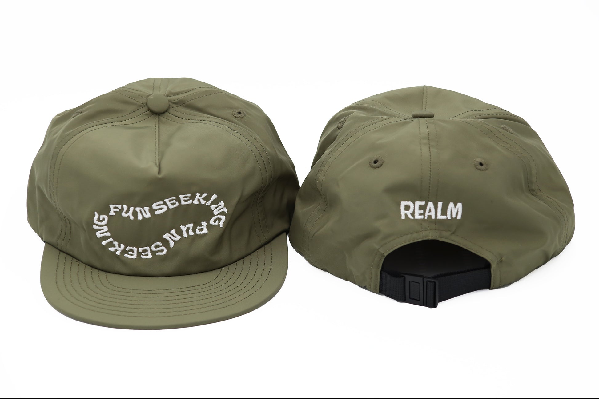 olive green nylon hat embroidered on the front with the image of the word "fun seeking" in an organic shape, logo "realm" embroidered on the back